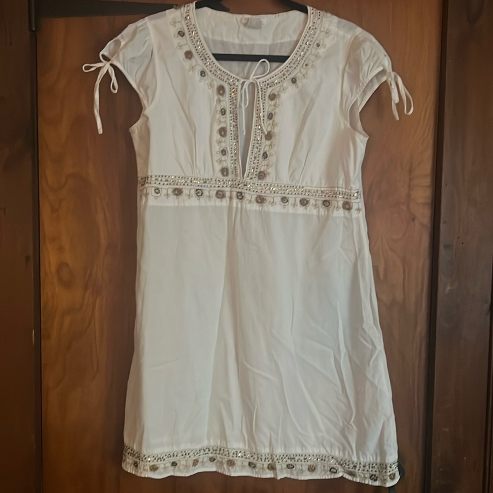 White with gold embroidered design some wood beads
